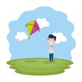 Little boy flying kite in the field Royalty Free Stock Photo