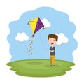 Little boy flying kite in the field Royalty Free Stock Photo