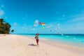 Little boy flying a kite on tropical beach Royalty Free Stock Photo