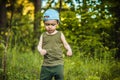 Little boy in a forest hiking Royalty Free Stock Photo