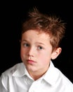 Little boy with a forlorn expression Royalty Free Stock Photo