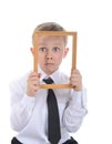 Little boy with a frame in his hands. Royalty Free Stock Photo