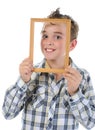 Little boy with a frame in his hands Royalty Free Stock Photo