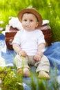 Little boy in the garden. Picnic.