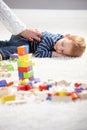 Little boy getting tired in playing Royalty Free Stock Photo