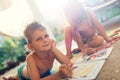 Little boy and girl drawing with crayons Royalty Free Stock Photo