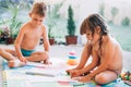 Little boy and girl drawing with crayons Royalty Free Stock Photo