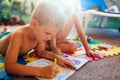 Little boy and girl drawing with crayons Royalty Free Stock Photo