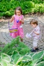 Little Boy and Girl on an Easter Egg Hunt Royalty Free Stock Photo