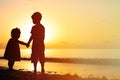 Little boy and girl holding hands at sunset Royalty Free Stock Photo