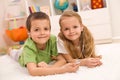 Little boy and girl listening to music together Royalty Free Stock Photo