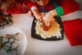 Little boy and girl making christmas cookies at home Royalty Free Stock Photo