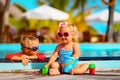 Little boy and girl playing in swimming pool at beach Royalty Free Stock Photo