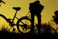 Little boy and girl riding bikes at sunset, active kids sport, Asian kid,Silhouette a kid at the sunset, Happy time. Royalty Free Stock Photo