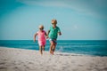 Little boy and girl run play at beach Royalty Free Stock Photo