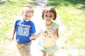Little boy and girl running in the park Royalty Free Stock Photo