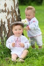 Little boy and girl in russian folk costumes near Royalty Free Stock Photo