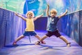 Little Boy and girl watching tropical coral fish in large sea life tank. Kids at the zoo aquarium Royalty Free Stock Photo