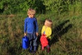 Little boy and girl working in the garden Royalty Free Stock Photo