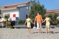 Little boy and girls walking on beach Royalty Free Stock Photo