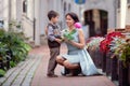 Little boy giving flower to his mom Royalty Free Stock Photo