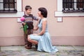 Little boy giving flower to his mom Royalty Free Stock Photo