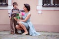 Little boy giving flower to his mom Royalty Free Stock Photo