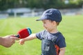 Little boy giving a interview after the match