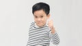 Little boy giving you thumbs up, close up Royalty Free Stock Photo