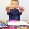 little boy with glasses correcting myopia close-up portrait Ophthalmology problem selective focus Royalty Free Stock Photo