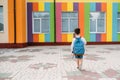 Little boy going back to school. Child with backpack and books on first school day. Back view. School concept. Back to Royalty Free Stock Photo