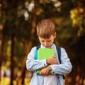 Little boy going back to school. Child with backpack and books. Royalty Free Stock Photo