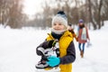 Little boy going ice skating with his family Royalty Free Stock Photo