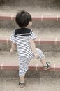 Little boy going up stairs Royalty Free Stock Photo