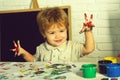 Little boy hands painted in colorful paints. Childhood. Colorful painted hands from a beautiful young boy. Happy kids Royalty Free Stock Photo