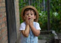 Little boy hands painted in colorful paints. Happy kid having fun outdoors. Royalty Free Stock Photo