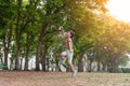 Little boy happy smiling and playing outdoor. Lovely boy running on meadow smiling and jumping, stop motion shot Royalty Free Stock Photo