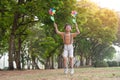 Little boy happy smiling and playing outdoor. Lovely boy running on meadow smiling and jumping, stop motion shot Royalty Free Stock Photo