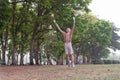 Little boy happy smiling and playing outdoor. Lovely boy running on meadow smiling and jumping, stop motion shot Royalty Free Stock Photo