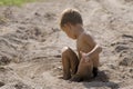 Little boy has outlined round itself a circle