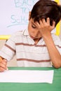 Little boy has troubles with homework Royalty Free Stock Photo