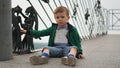 Little boy having fun on a playground outdoors in summer. Toddler on a slide Royalty Free Stock Photo