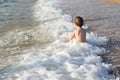 Little boy having fun in the sea Royalty Free Stock Photo