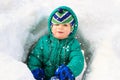 Little boy having fun in winter snow Royalty Free Stock Photo