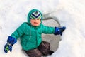 Little boy having fun in winter snow Royalty Free Stock Photo
