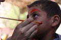 Little boy having his face painted Kids having fun playing Royalty Free Stock Photo