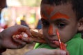 Little boy having his face painted Kids having fun playing Royalty Free Stock Photo