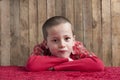 Little boy, head resting on his arms Royalty Free Stock Photo