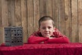 Little boy, head resting on his arms Royalty Free Stock Photo