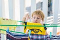 A little boy helps her mother to hang up clothes Royalty Free Stock Photo